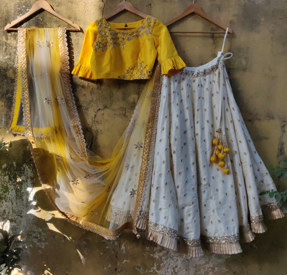 Ivory Ruffle Lehenha with Yellow Ruffle Blouse - Fashion Brand & Designer Priti Sahni