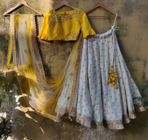 Ivory Ruffle Lehenha with Yellow Ruffle Blouse Lehengas
