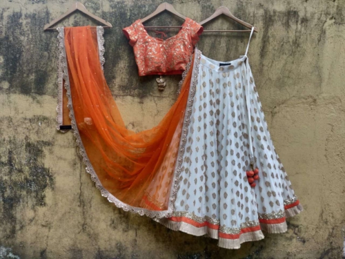 Orange and Ivory Ruffle Lehenga Lehengas
