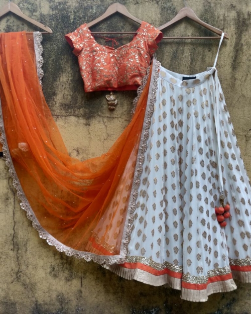Orange and Ivory Ruffle Lehenga - Fashion Brand & Designer Priti Sahni