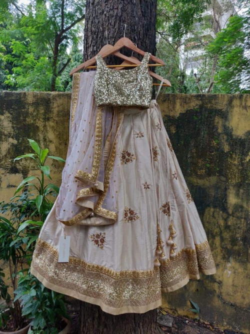 Off-white and Antique Gold Lehenga Lehengas