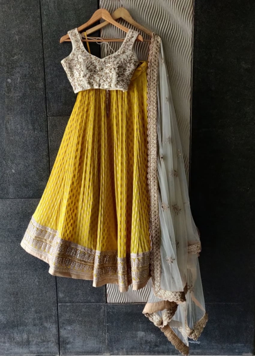 Yellow Lehenga with Ivory Raw Silk Embroidered Blouse Lehengas