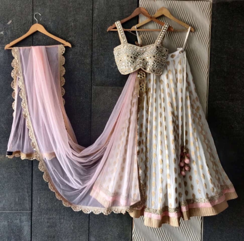 Ivory Ruffle Lehenga and Mirror Bustier Lehengas