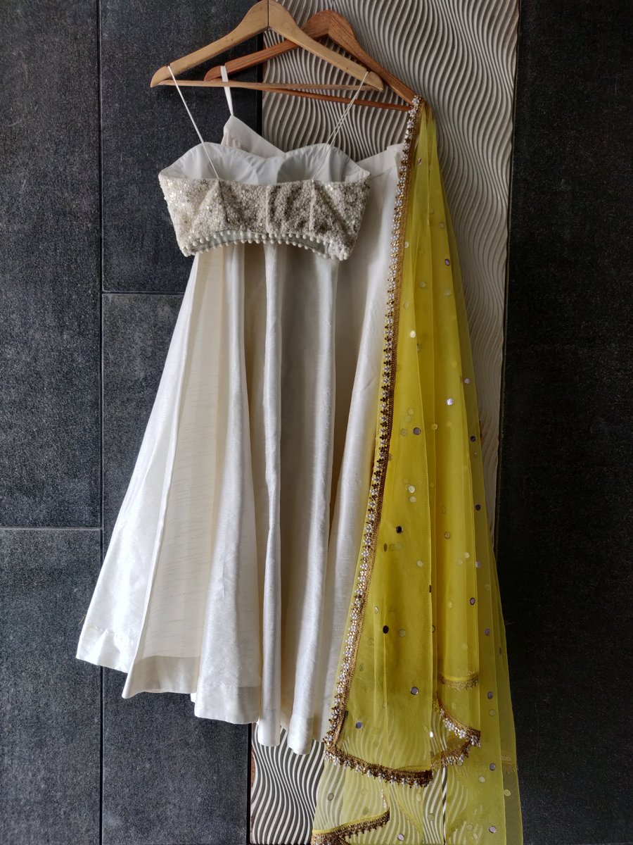 Ivory and Yellow Thread Work Bustier and Lehenga Set - Fashion Brand & Designer Priti Sahni 2