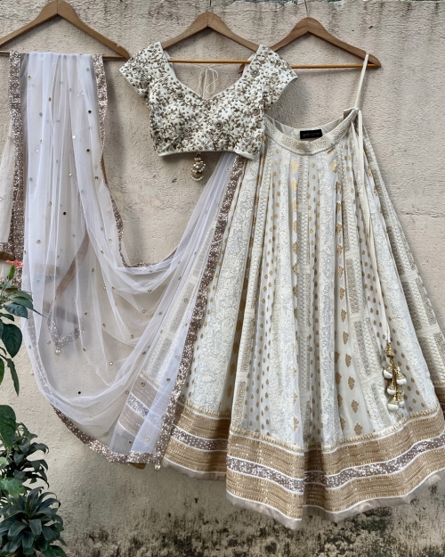 Ivory Multipaneled Lehenga Set with Embroidered Blouse Bridal Couture