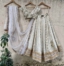 Ivory Multipaneled Lehenga Set with Embroidered Blouse Anniversary Sale