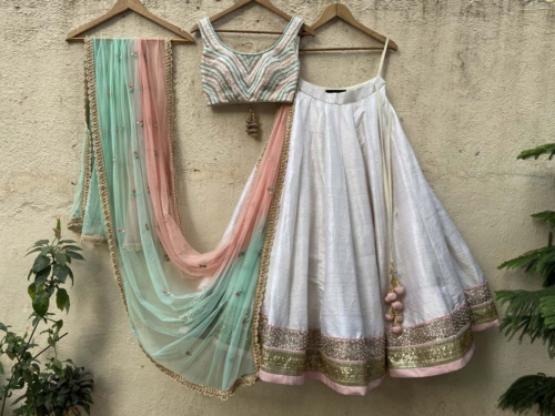 Off-White Raw Silk Lehenga Set with Colorful Blouse Lehengas