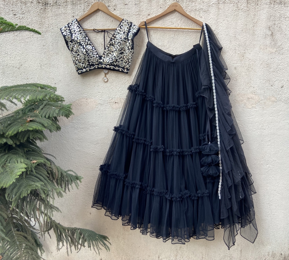 Black Tier Skirt With Black Raw Silk Mirror Work Blouse - Fashion Brand & Designer Priti Sahni