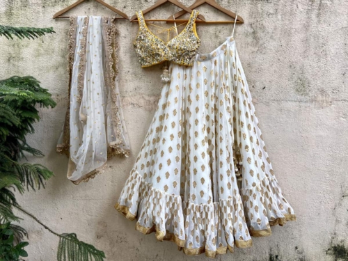 Ivory Ruffle Lehenga Set with Yellow Mirror Work Blouse Lehengas