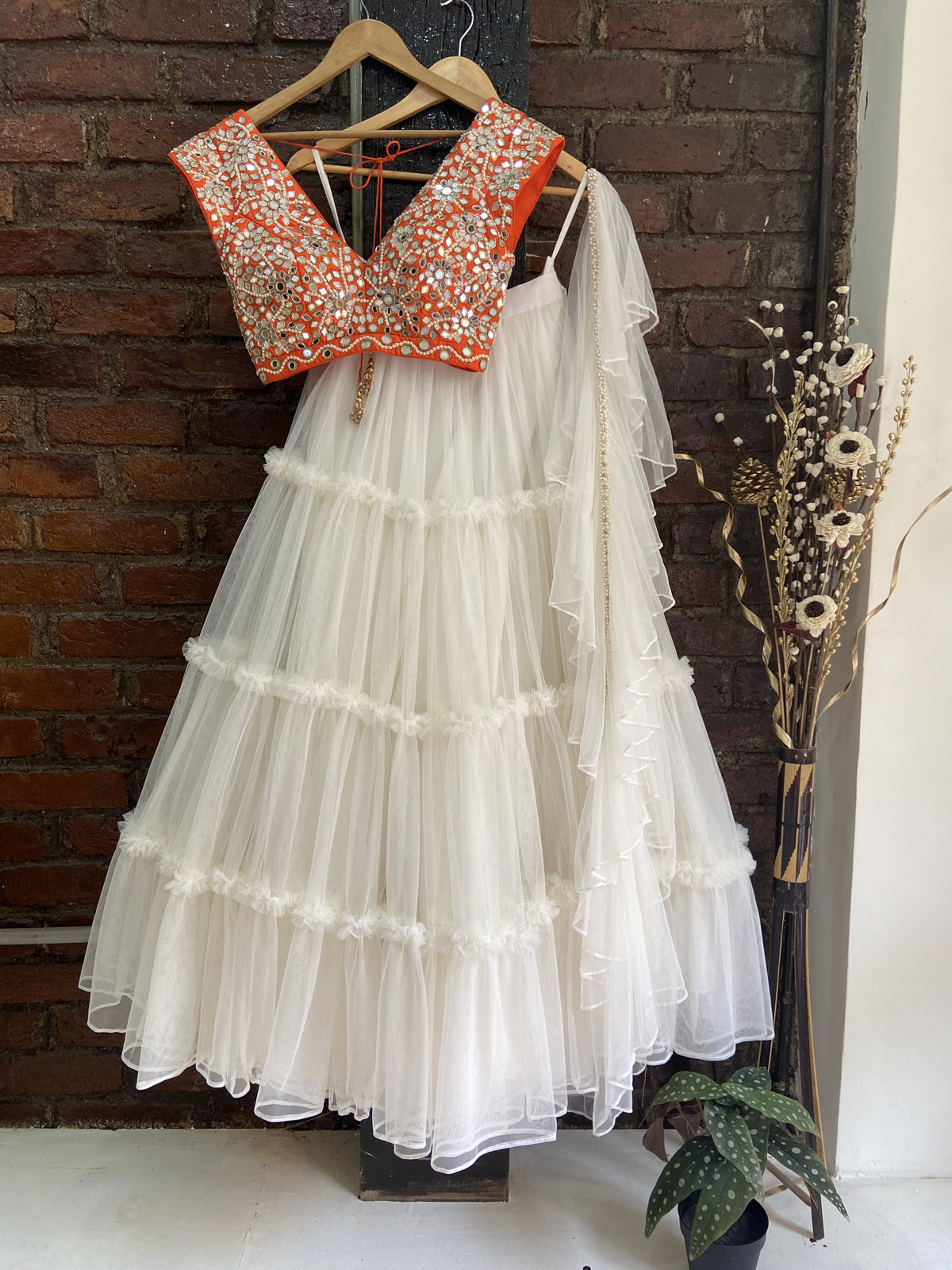 Ivory and Orange Tier Lehenga Set - Fashion Brand & Designer Priti Sahni
